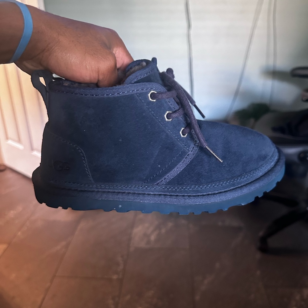 women blue high top uggs